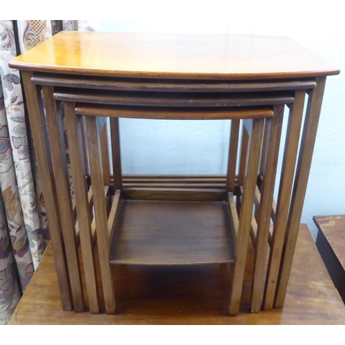 175 - Eight items of small furniture: to include an Art Deco walnut occasional table  22