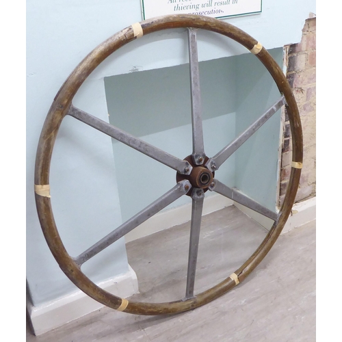 191 - An early 20thC wooden and alloy ships wheel  43