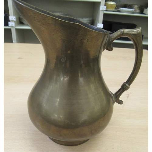 212 - A 20thC bronze ewer