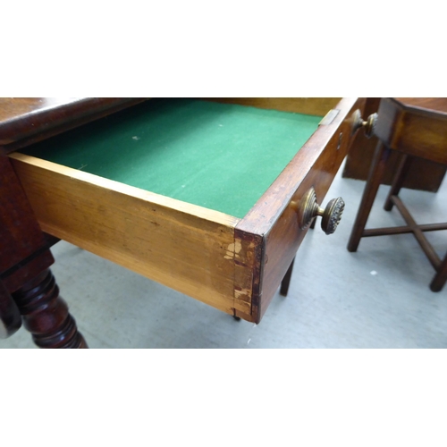 234 - A George III mahogany Pembroke table, raised on ring turned legs and casters  28