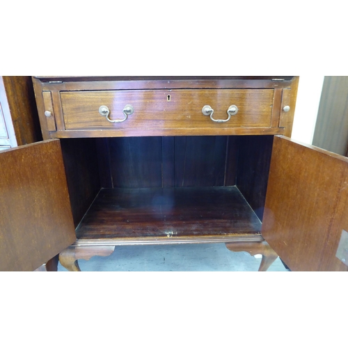 239 - An Arts & Crafts string inlaid mahogany bureau bookcase with a pair of glazed doors, over a fall... 