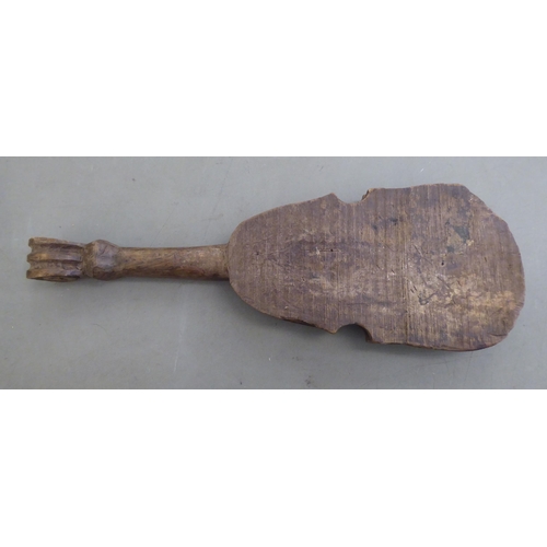 243 - A vintage carved wooden papier mache mould, fashioned as a fiddle  22