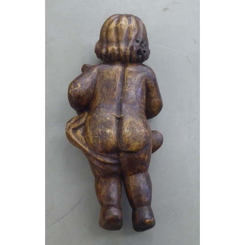 253 - A vintage carved wooden papier mache mould, fashioned as a standing cherub with a lyre  18