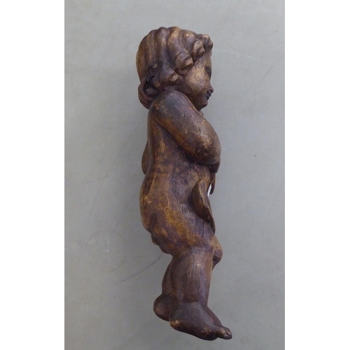 253 - A vintage carved wooden papier mache mould, fashioned as a standing cherub with a lyre  18