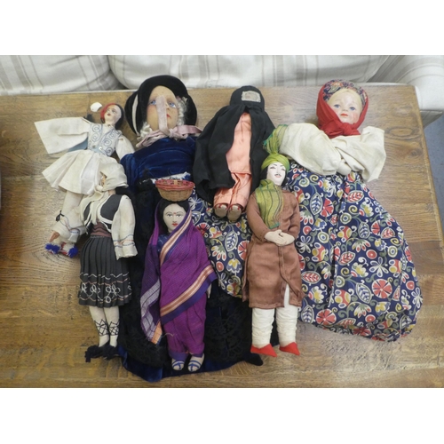 265 - Dolls: to include a 1930s felt example, wearing a bonnet and blue dress  17