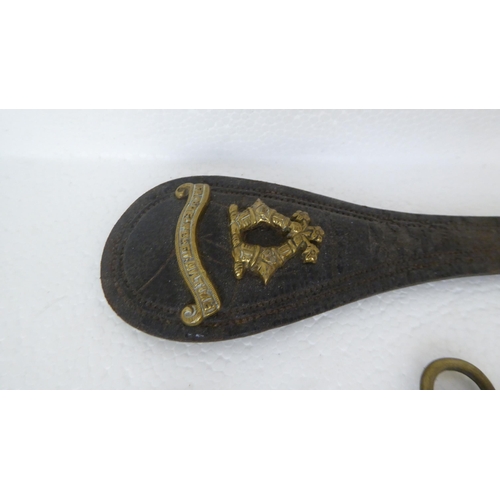 272 - Military and livery horse brasses and cap badges (Please Note: this lot is subject to the state... 