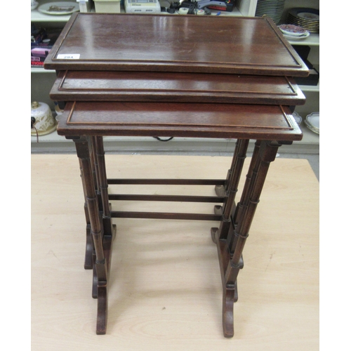 294 - Small furniture: to include a 20thC nesting set of three mahogany occasional tables  largest 23... 