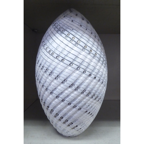 301 - An Art glass ornament of ovoid form with white and brown spiral ornament  9