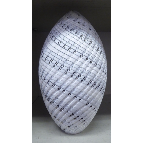 301 - An Art glass ornament of ovoid form with white and brown spiral ornament  9