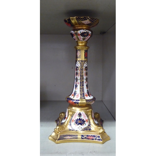 303 - A Royal Crown Derby china candlestick, decorated in the Imari palette, pattern no.1128  11