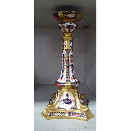 303 - A Royal Crown Derby china candlestick, decorated in the Imari palette, pattern no.1128  11