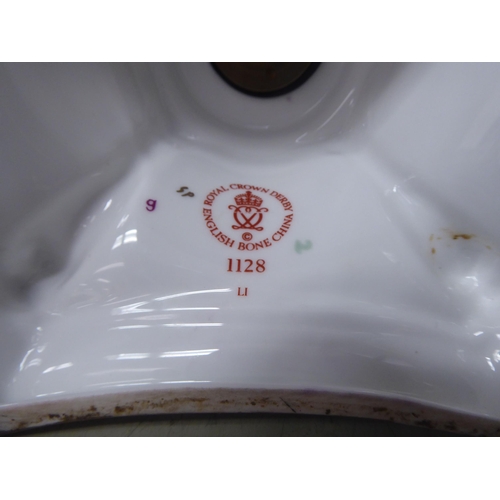 303 - A Royal Crown Derby china candlestick, decorated in the Imari palette, pattern no.1128  11