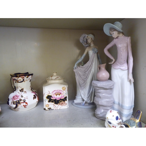 305 - China ornaments and figures: to include a Lladro porcelain figure, a lady in Art Nouveau costume&nbs... 