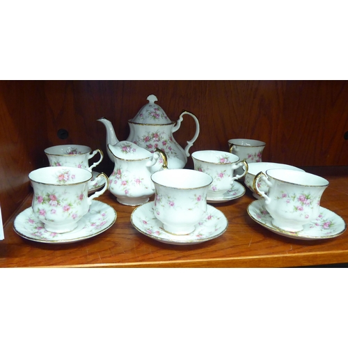 308 - Paragon china Victorian Rose pattern teaware  comprising six cups and saucers, a teapot, sugar ... 