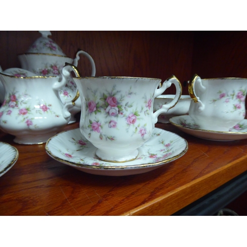 308 - Paragon china Victorian Rose pattern teaware  comprising six cups and saucers, a teapot, sugar ... 