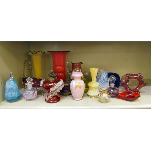 318 - Glassware: to include a Mary Gregory style cranberry coloured cream jug and beaker