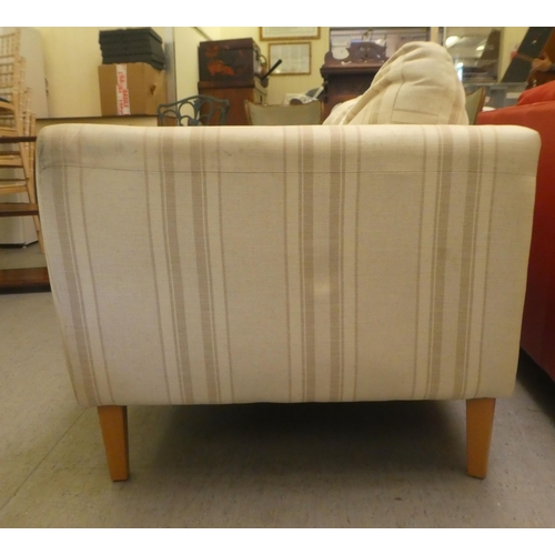 319 - A modern two person settee, upholstered in stripe patterned fabric with cushioned seats, raised on s... 