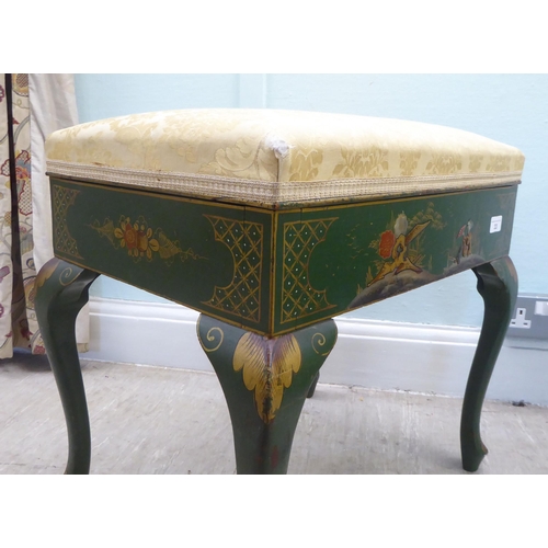 33 - A 1920s chinoiserie decorated green and gilt painted box top piano stool with a hinged lid, raised o... 