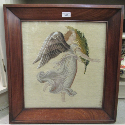 338 - A late Victorian needlework panel, depicting a winged maiden  16