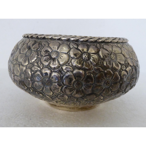 342 - A Continental silver coloured metal bowl with dressed floral decoration  stamped 900  6