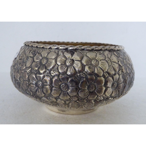 342 - A Continental silver coloured metal bowl with dressed floral decoration  stamped 900  6