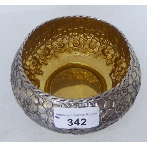 342 - A Continental silver coloured metal bowl with dressed floral decoration  stamped 900  6