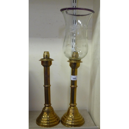 345 - A pair of late Victorian brass candlesticks  13