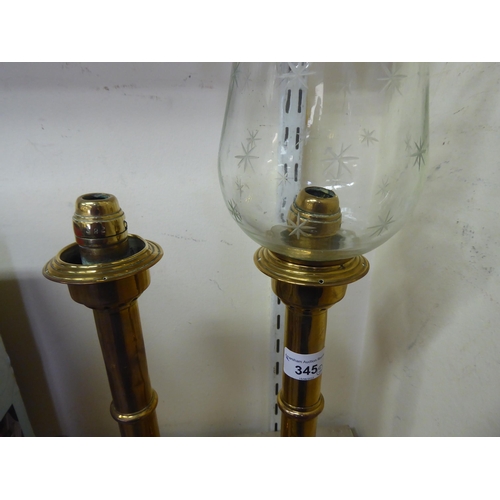 345 - A pair of late Victorian brass candlesticks  13