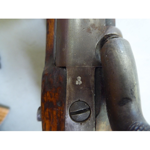 352 - An early 19thC brass mounted mahogany percussion pistol (for display purposes)