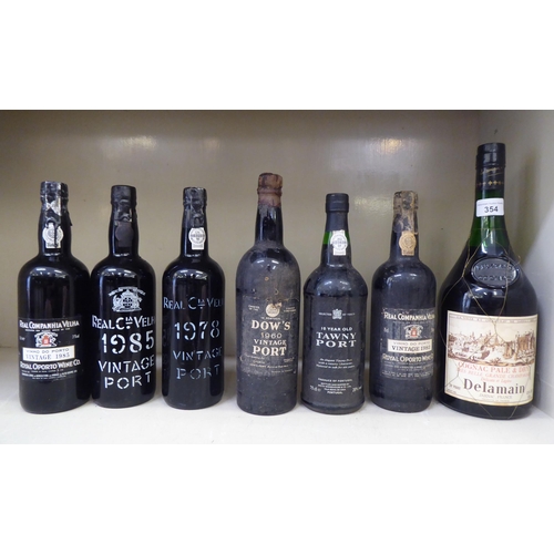 354 - A bottle of Delamain Cognac; and six bottles of port: to include a 1960's Dow's 