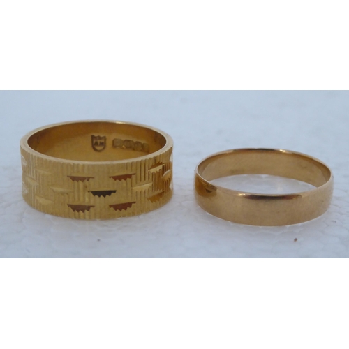 360 - Two 18ct gold rings 