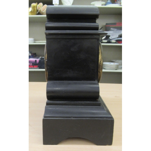 387 - A late Victorian black slate cased mantel clock; the movement faced by a Roman dial  13