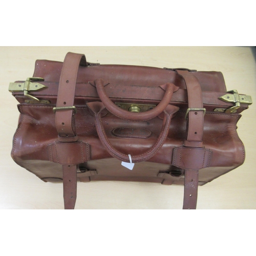 391 - An early mid 20thC Carell mid tan coloured, moulded and stitched hide Gladstone bag with lacquered b... 