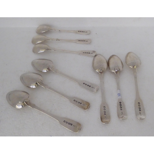 395 - A matched set of six early 19thC silver fiddle pattern teaspoons and three contemporary mustard spoo... 