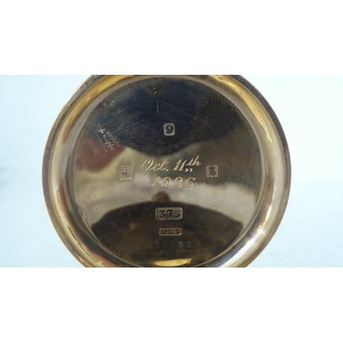 401 - A Dennison 9ct gold cased half-hunter pocket watch, the keyless 15 jewel movement faced by a white e... 