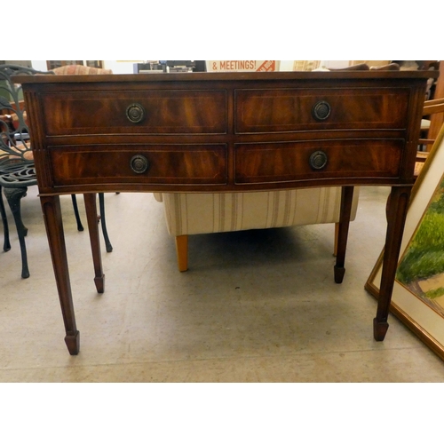 422 - A Regency style mahogany finished serpentine front, four drawer serving table, raised on square, tap... 