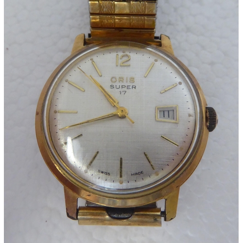 424 - Wristwatches: to include an Oris super 17 gold plated bracelet watch, faced by a baton dial 