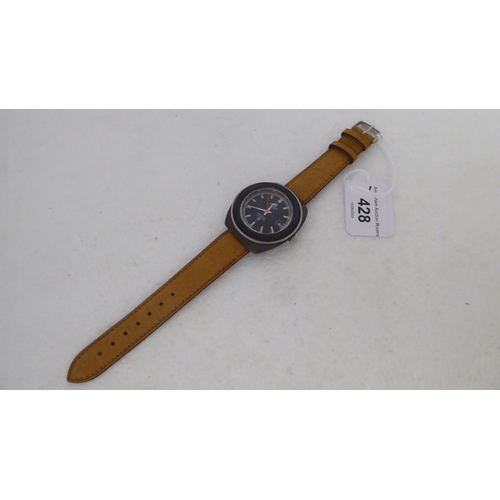 428 - A 1970s Tissot Sideral automatic wristwatch with a fibreglass case, faced by a baton dial and subsid... 