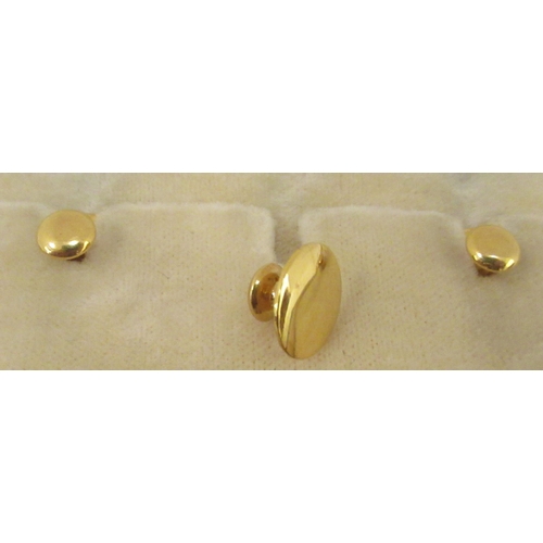 46 - A pair of 18ct gold engine turned, oval tablet and chain cufflinks; and a set of three shirt studs&n... 