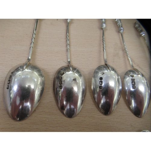 54 - Silver and silver coloured flatware, mainly tea and coffee spoons  various designs  mixed ... 