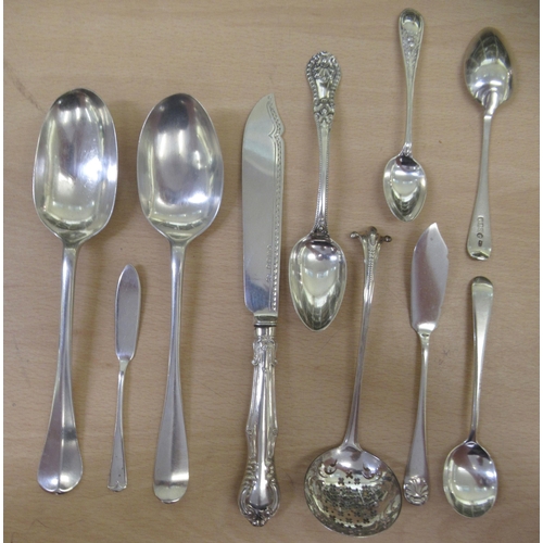 54 - Silver and silver coloured flatware, mainly tea and coffee spoons  various designs  mixed ... 