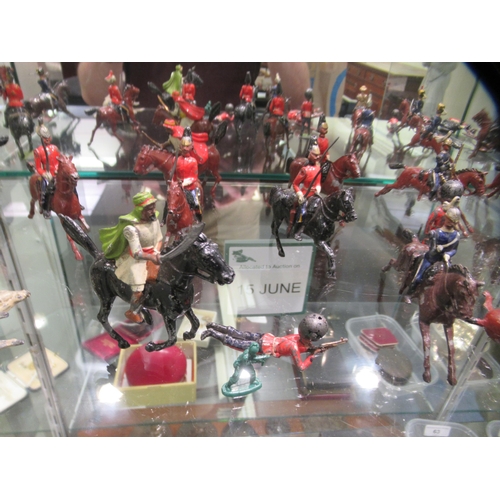 58 - A collection of vintage, painted diecast model soldiers, mainly household cavelry