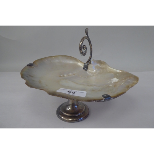 69 - A late 19thC sweet dish, fashioned from a seashell, elevated on a silver plated stand  4