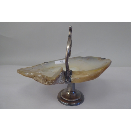 69 - A late 19thC sweet dish, fashioned from a seashell, elevated on a silver plated stand  4