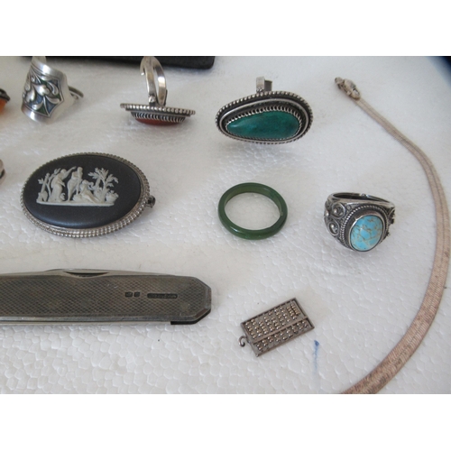 71 - Silver jewellery and collectables: to include a ring set with a red stone  