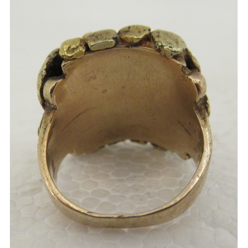 99 - A 10ct gold ring shank, mounted with a gold nugget