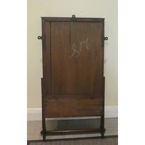 313 - A late Victorian mahogany bathroom cabinet with a mirror, over a hinged compartment and towel rail  ... 