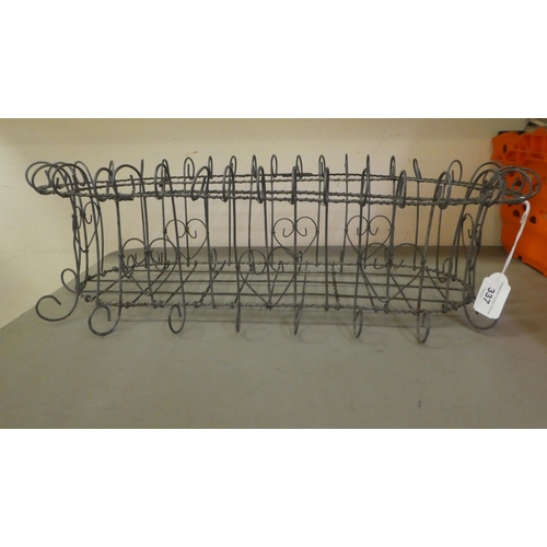 337 - Two similar wire framed planter holders  7