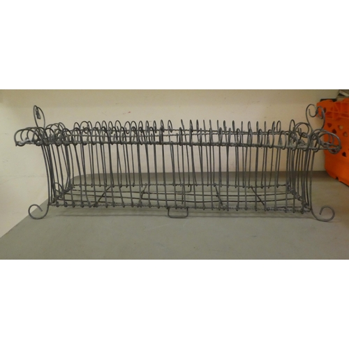 337 - Two similar wire framed planter holders  7