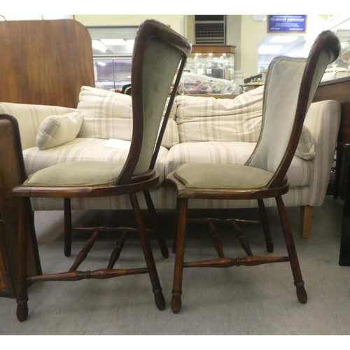 416 - A pair of early 20thC beech framed, waisted balloon back side chairs, upholstered in braided, sage g... 